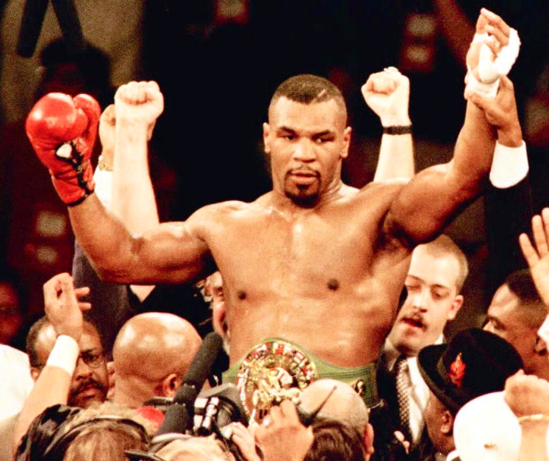 Mike Tyson Hand Signed Everlast Black Boxing Glove in Display Dome